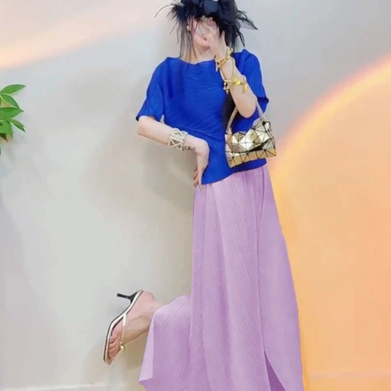 طقم نسائي من قطعتين بتصميم مطو - مراجعة Asymmetric Top Women وسعره