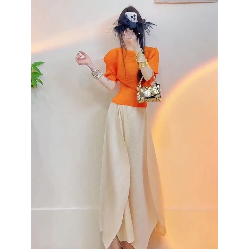 طقم نسائي من قطعتين بتصميم مطو - مراجعة Asymmetric Top Women وسعره