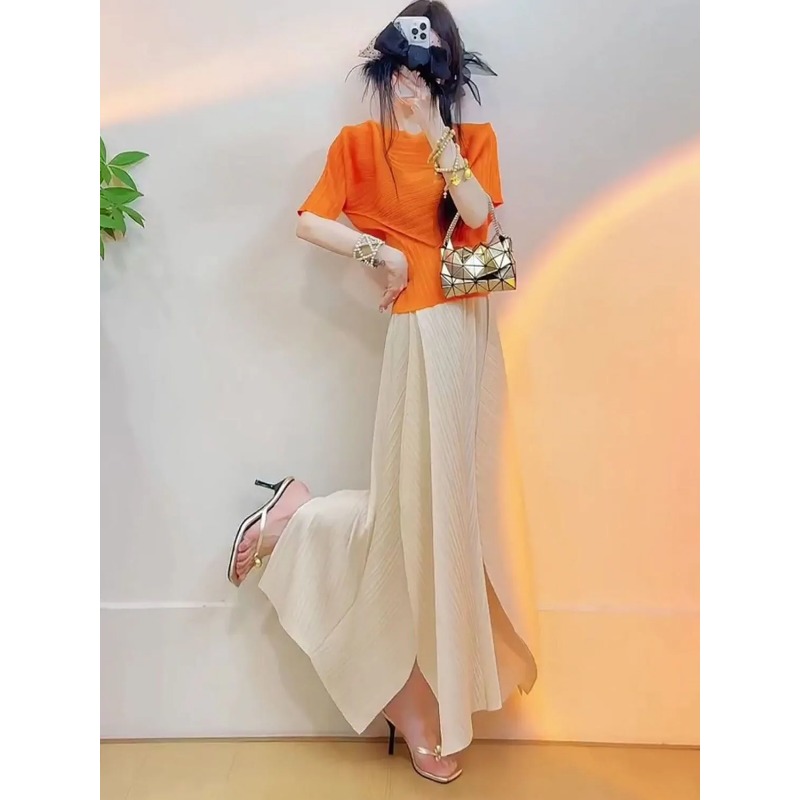 طقم نسائي من قطعتين بتصميم مطو - مراجعة Asymmetric Top Women وسعره